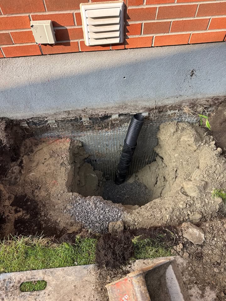 Egress window in Ottawa, Drain and window well added - Image 6