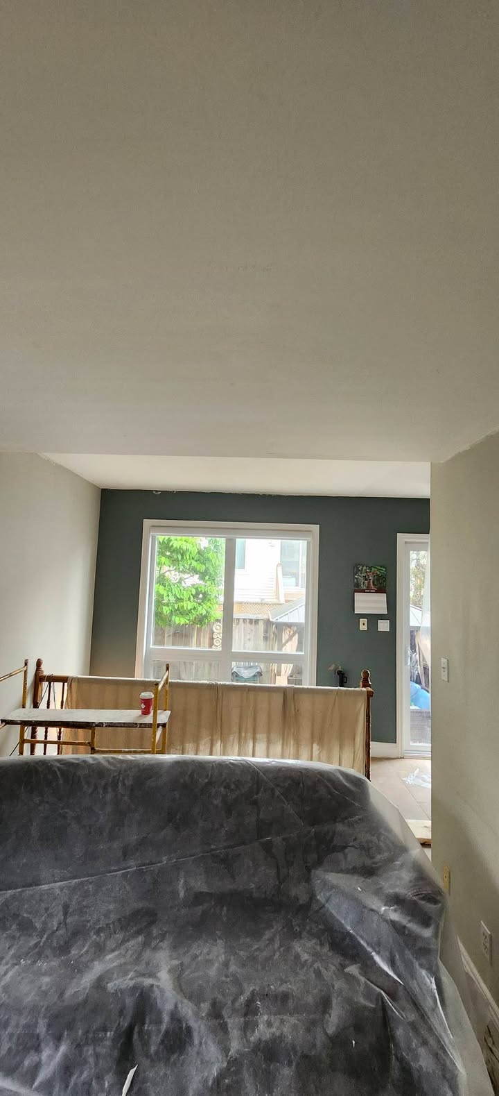 Stipple ceiling removal completed. - Image 7