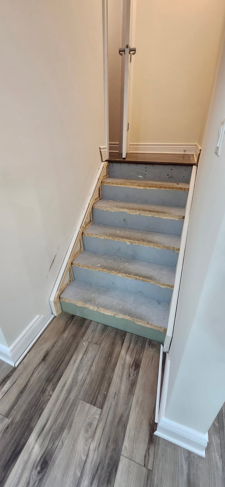 From Unfinished Pine to Red Oak: A Stunning Staircase Transformation! - Image 1