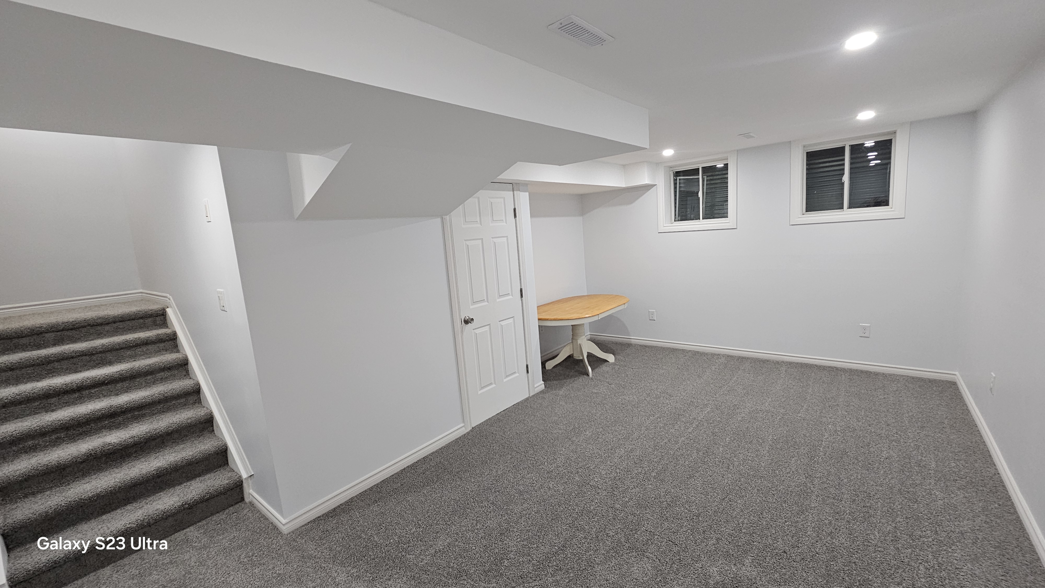 We just completed another basement renovation project, transforming the space into a modern, functional, and beautifully finished area. High-quality work you can trust! - After